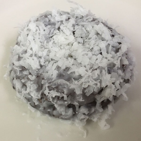 Chocolate-Coconut-donut.-It-is-a-chocolate-cake-donut-that-is-glazed-and-dipped-in-coconut